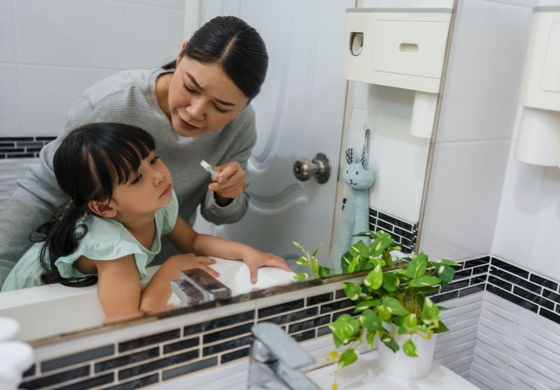 Child struggling with morning routine for kids before school